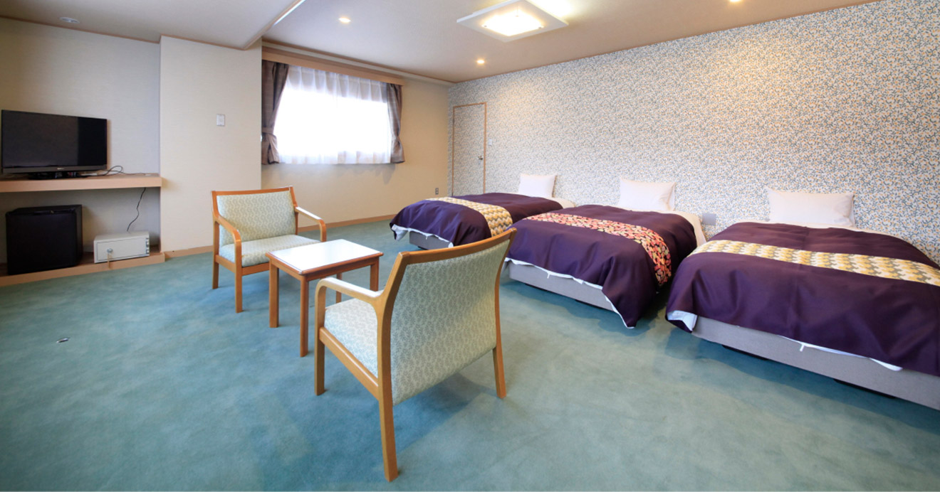 洋室シモンズベッドルームH1